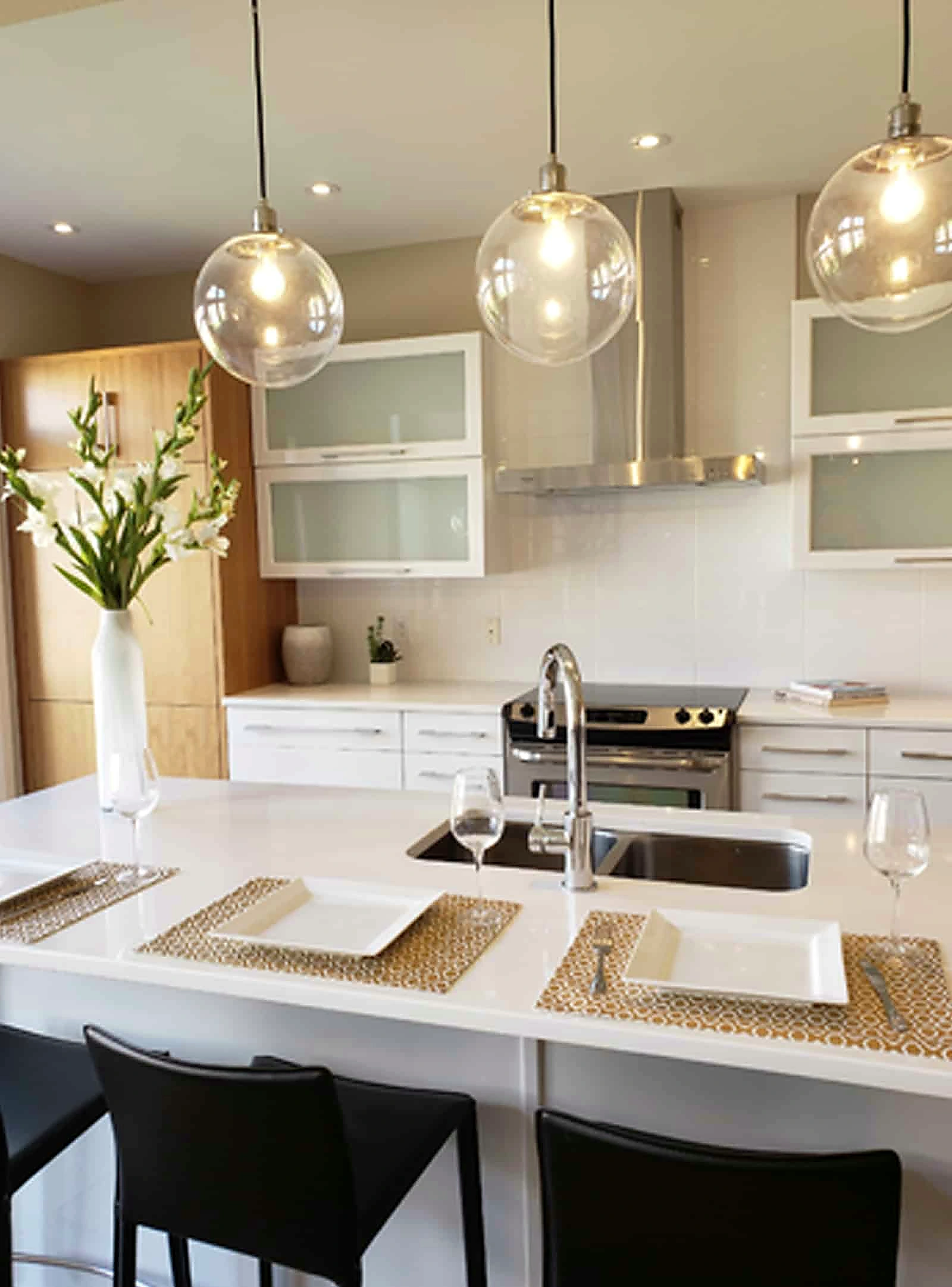 Bright kitchen with pendant lights over the island
