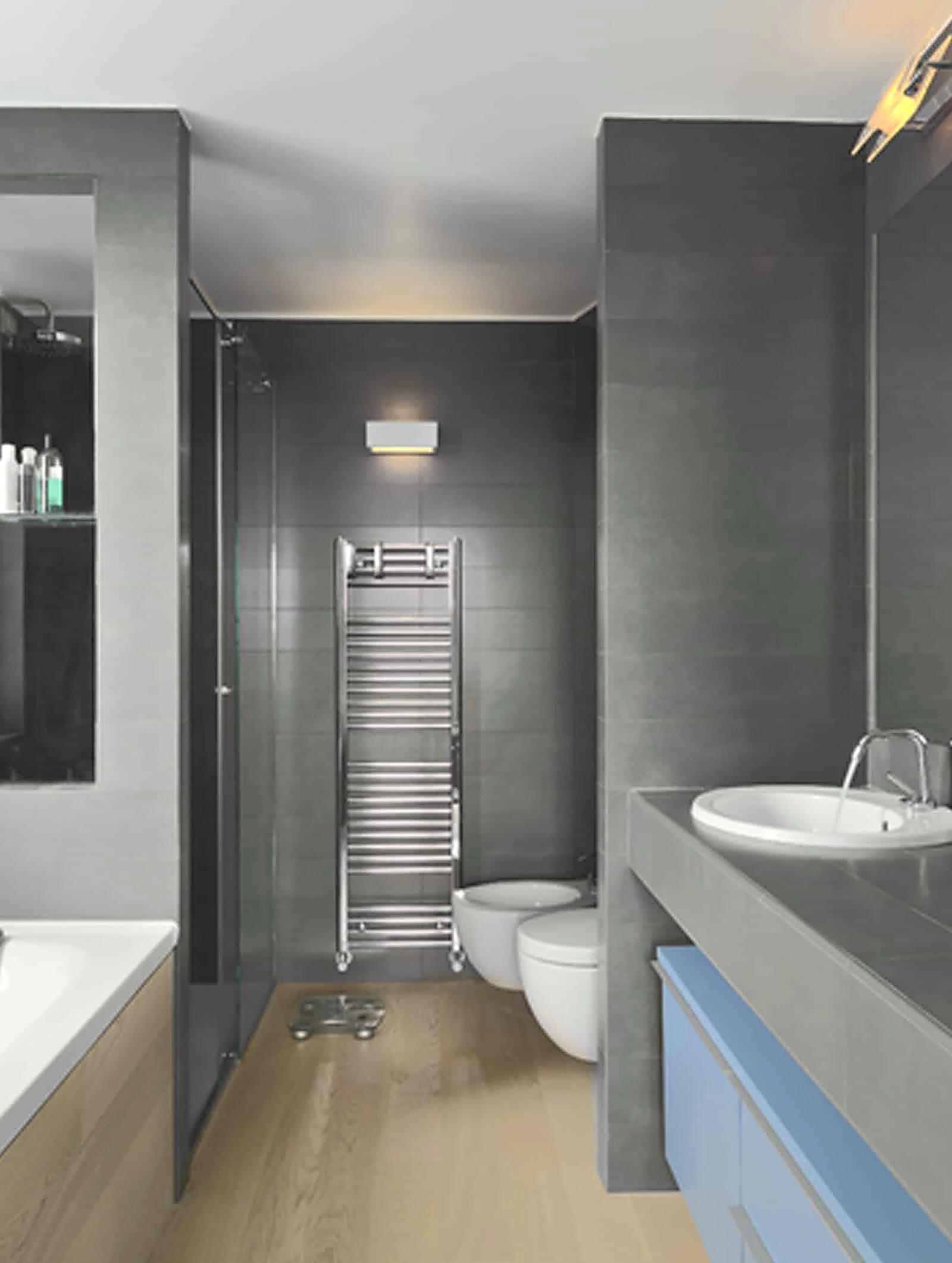 Modern dark bathroom with a walk-in rainfall shower